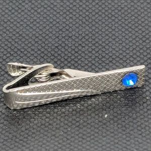 Vintage silver tone tie bar w/ blue rhinestone